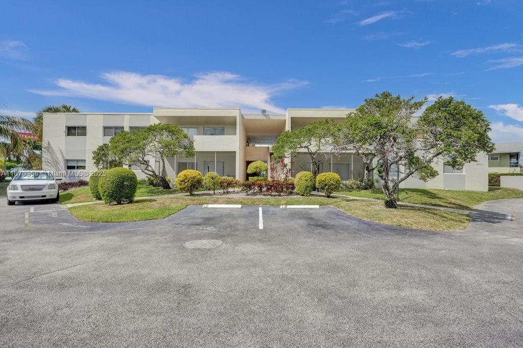 Discover this spacious 3-bed, 2-bath condo offering stunning lake and pool views in a prime Deerfield Beach location. Step inside to a welcoming foyer that opens to a bright & airy living room, complete with a convenient bar counter for entertaining. The balcony is the perfect spot to relax while overlooking the sparkling pool and tranquil water. The spacious primary bedroom boasts a walk-in closet and a private ensuite bath, creating a comfortable retreat. Additional highlights include a dedicated laundry area that maximizes both comfort and style. Located in a well-maintained community, this condo is ideal for both homeowners and investors—can be rented immediately with fast HOA approval. Enjoy the best of South Florida living just minutes from shopping, dining, and major highways.
