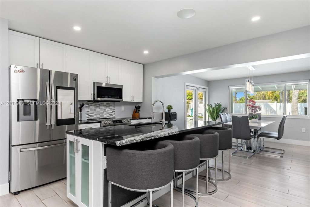 Photo of 1183 SE 1st Ter, Deerfield Beach, FL 33441 (MLS # A12012906)