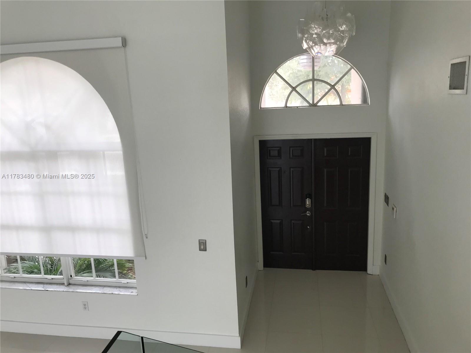 10957 NW 59th St .