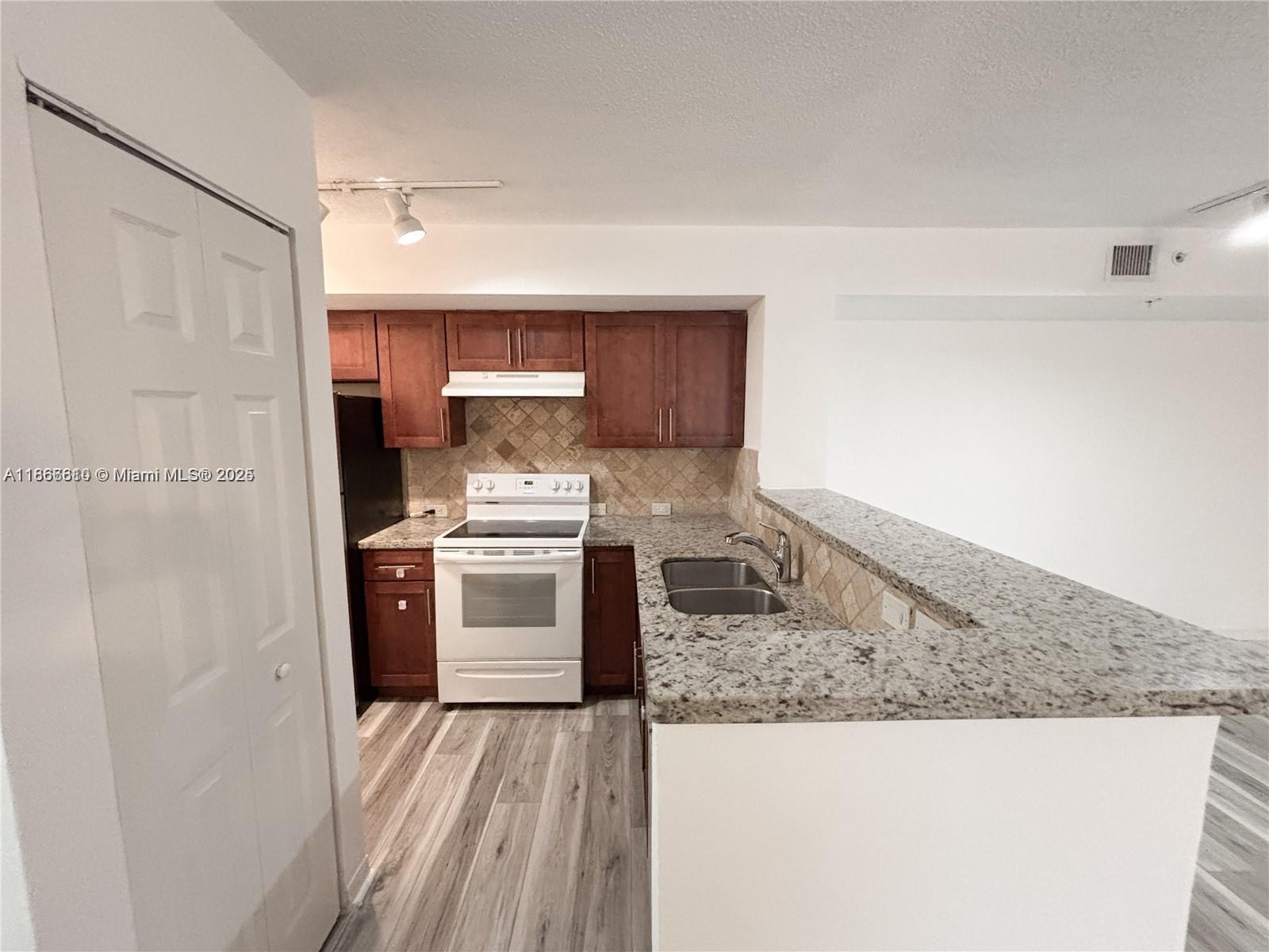 DEVONAIRE CONDO AT PEMBRO - Residential