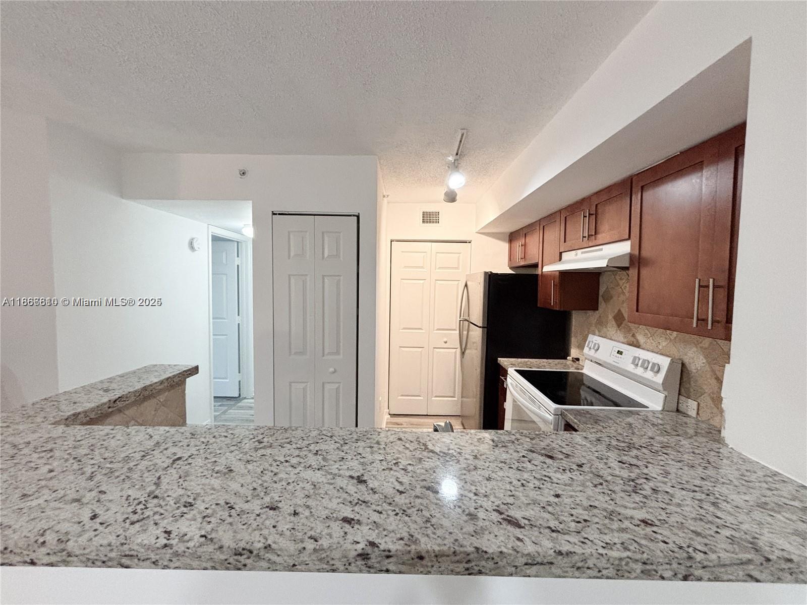 DEVONAIRE CONDO AT PEMBRO - Residential