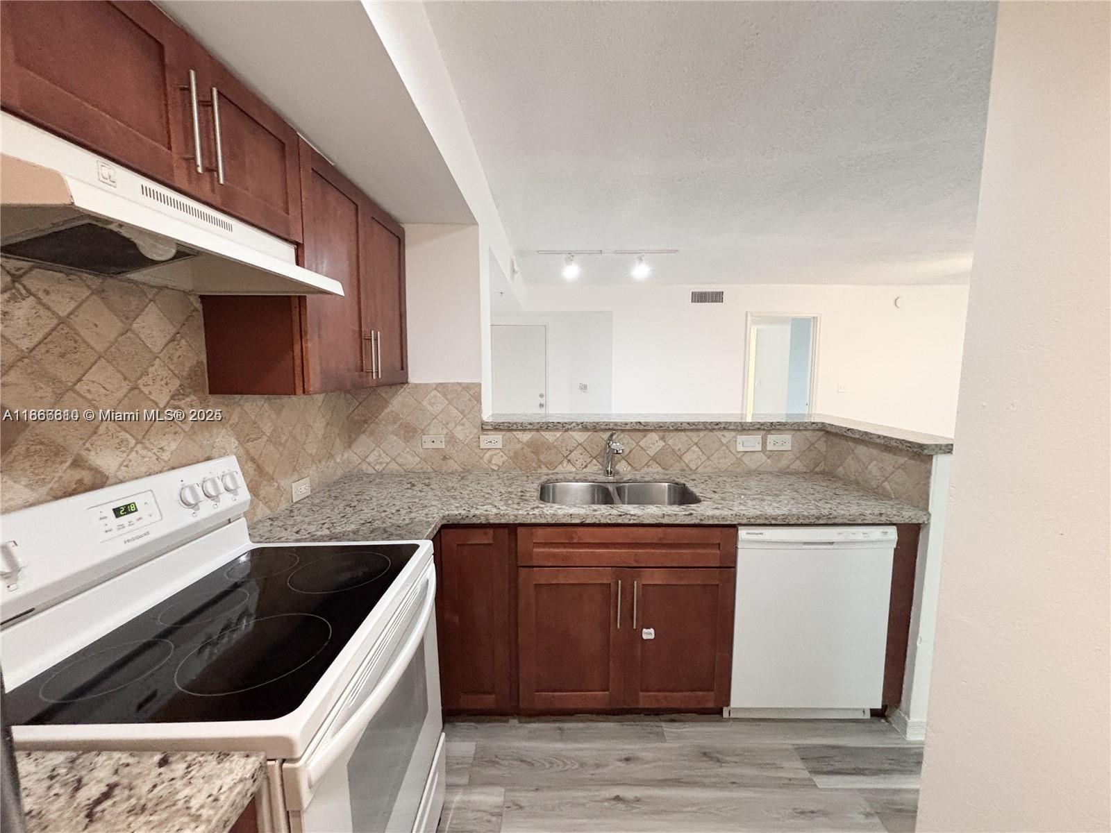 DEVONAIRE CONDO AT PEMBRO - Residential