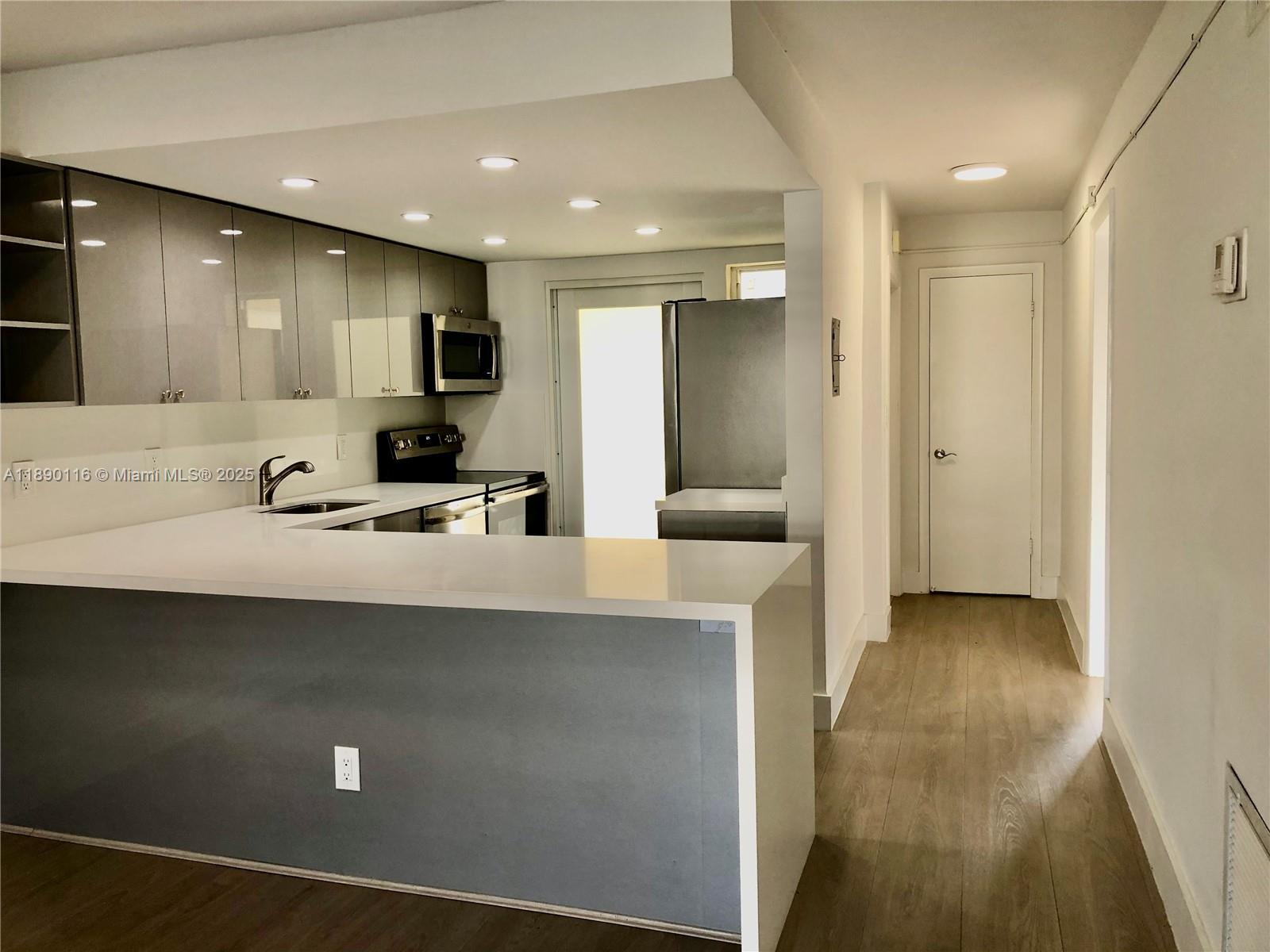 Fully renovated, bright and beautiful 2/2 with beach access from Beach Park where you can enjoy sunrise and water fountain. Second floor with beautiful tree top views. Brand new stainless steel appliances, vinyl wood floors, hurricane protected windows with doble treatment. 1 assigned parking space(#39)Washer and dryer on first floor, elevator, terrace to entertain, share pool and multi use room with 240 Galen building. Walking distance to the beach, restaurants, school, shops and Community Center.