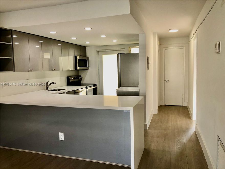 Fully renovated, bright and beautiful 2/2 with beach access from Beach Park where you can enjoy sunrise and water fountain. Second floor with beautiful tree top views. Brand new stainless steel appliances, vinyl wood floors, hurricane protected windows with doble treatment. 1 assigned parking space(#39)Washer and dryer on first floor, elevator, terrace to entertain, share pool and multi use room with 240 Galen building. Walking distance to the beach, restaurants, school, shops and Community Center.