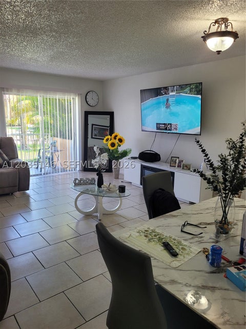 Photo of 18101 NW 68th Ave #E105, Hialeah, FL 33015 (MLS # A12035146)