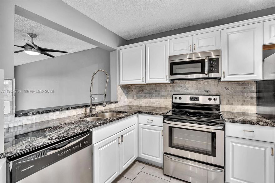 Investor-only opportunity offering immediate cash flow. Totally renovated 1 bedroom 1 bath condo with a new tenant moving in on 3/1/26, allowing an investor to start earning rental income right after closing.  Rented for $1,900/month. Features include granite countertops, stainless appliances, tile and vinyl wood floors.  Beautiful water views!  Washer and dryer inside the unit, and located within a gated community.  New roofs just installed and and no special assessments. This community is investor friendly!