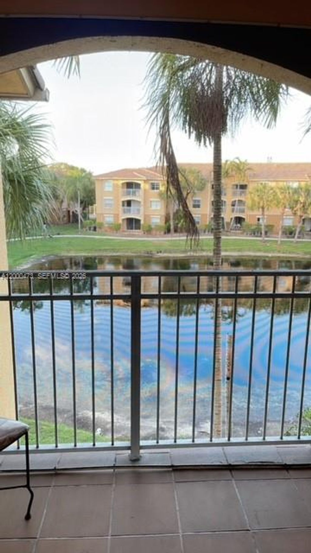 Photo of 9645 NW 1st Ct #1-303, Pembroke Pines, FL 33024 (MLS # A12000473)