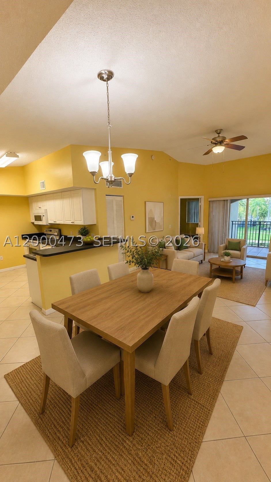 Photo of 9645 NW 1st Ct #1-303, Pembroke Pines, FL 33024 (MLS # A12000473)
