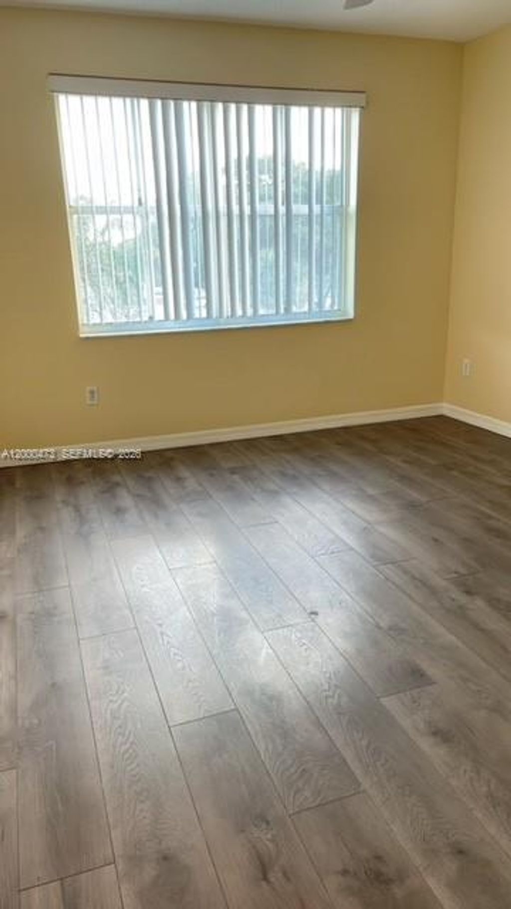 Photo of 9645 NW 1st Ct #1-303, Pembroke Pines, FL 33024 (MLS # A12000473)