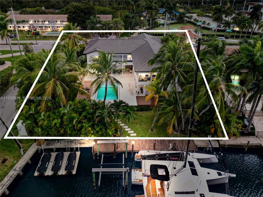 YACHTERS DREAM. A LOT on 100 feet of seawall with ocean access ready for you to relax, take in the breathtaking full ocean and intracoastal views in this exclusive neighborhood of Golden Isles. Extraordinary lot 15,000 sq ft. waterfront lot!! A beautifully fully renovated house with 6 cars garage and patio areas, 6 Bedrooms and 6.5 bathrooms beautifully island kitchen with granite countertops soaring light filled entry atrium custom built-ins included. Marble topped bar + dual living rooms formal dining room with high ends finishes. Do not miss out this opportunity in this gated community.