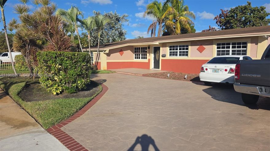 Welcome to this spacious well-maintained home situated on a 8250 lot, property features 4 comfortable bedrooms and 2 bathrooms with a circular driveway that provides plenty of parking for family and guest .kitchen is equipped with with granite countertops and wood cabinetry, large back  yard offers the potential to add a pool and features a customized outdoor living area , will sell fast , call or text listing agent for showing information.