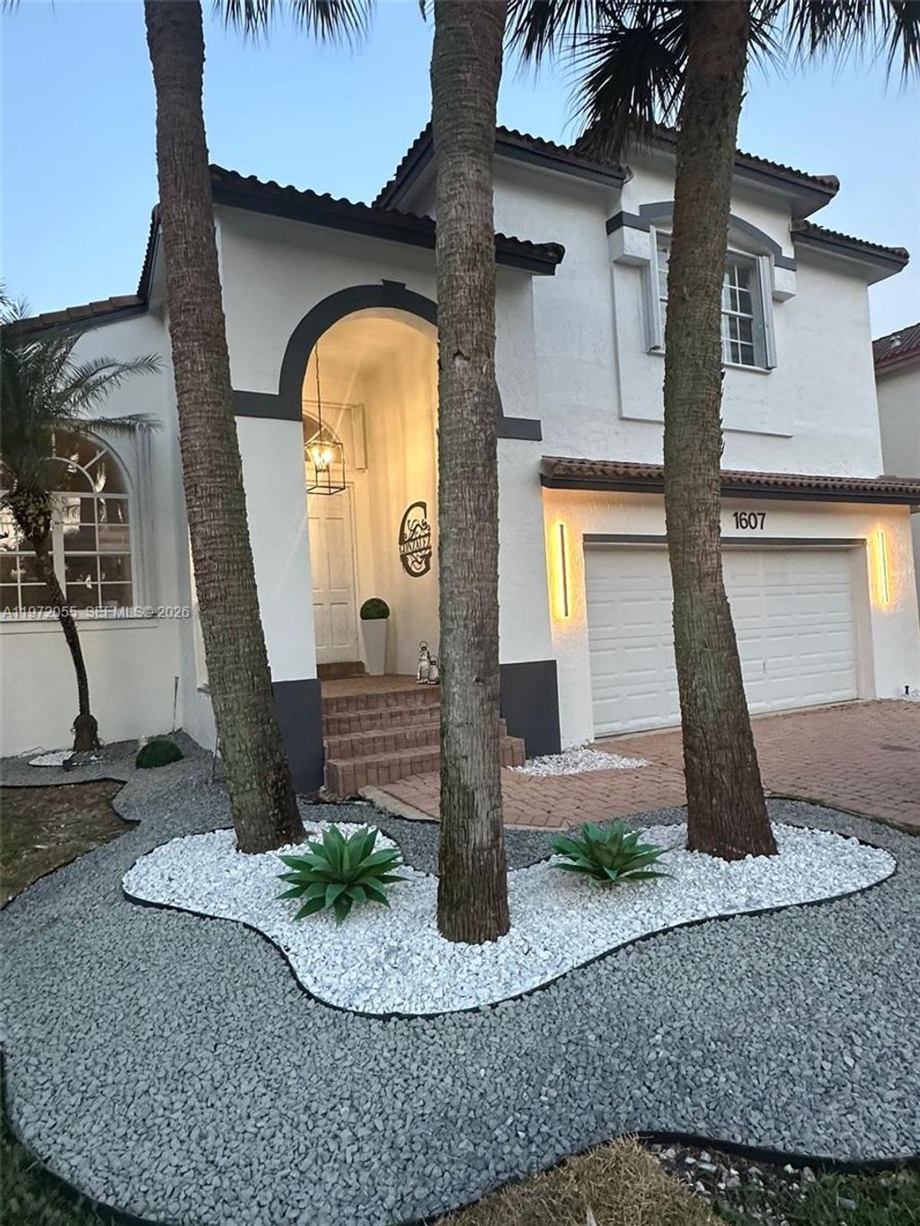 Photo of 1607 SW 157th Ave, Pembroke Pines, FL 33027 (MLS # A11972055)