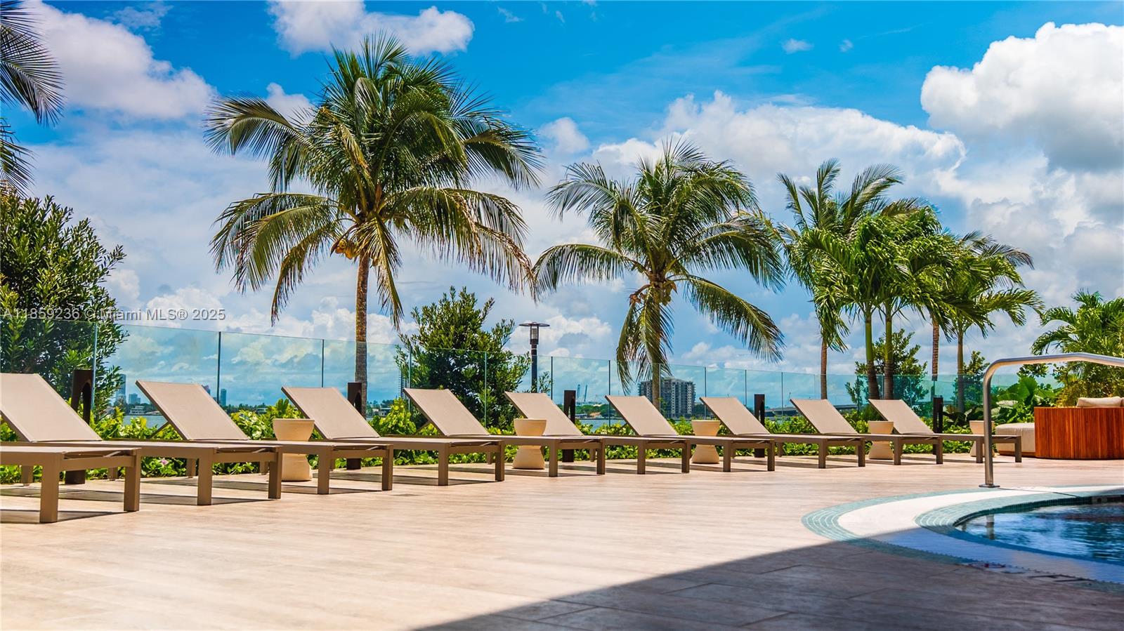 Brand-new 2025 luxury 3BR + den, 3.5BA with 1,750 SF + 229 SF terrace offering direct water views. Upgraded unit with custom closets & 2 assigned parking spaces. Enjoy 2 acres of resort-style amenities: private sports marina, 3 pools, spa, fitness center, wine lounge, kids’ play area, library, tennis, paddleball, basketball, mini golf & more. Prime location near Design District, Midtown, Brickell & MIA Airport.