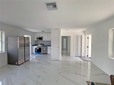 Photo of 1606 NW 12th Ave, Fort Lauderdale, FL 33311 (MLS # A12063713)