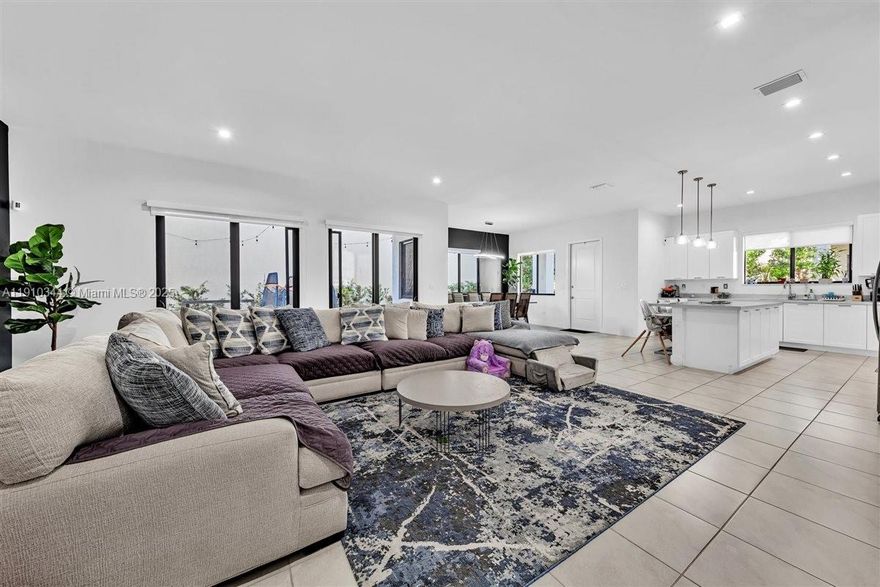 Discover the Tenerife contemporary-style home at Canarias in Downtown Doral. This residence offers 4
bedrooms, 3.5 bathrooms, and a 2-car garage. Enjoy a covered terrace, front porch, and four walk-in closets. A
full-size washer and dryer add convenience, while smart home features include alarm door contacts, keypad
access, kitchen phone connection, and cable wiring throughout. Delivered unfurnished, this home provides the
perfect canvas to create your ideal living space.