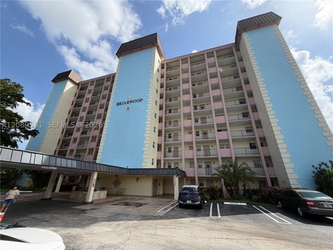 Photo of 3575 Broken Woods Dr #404, Coral Springs, FL 33065 (MLS # A12089531)