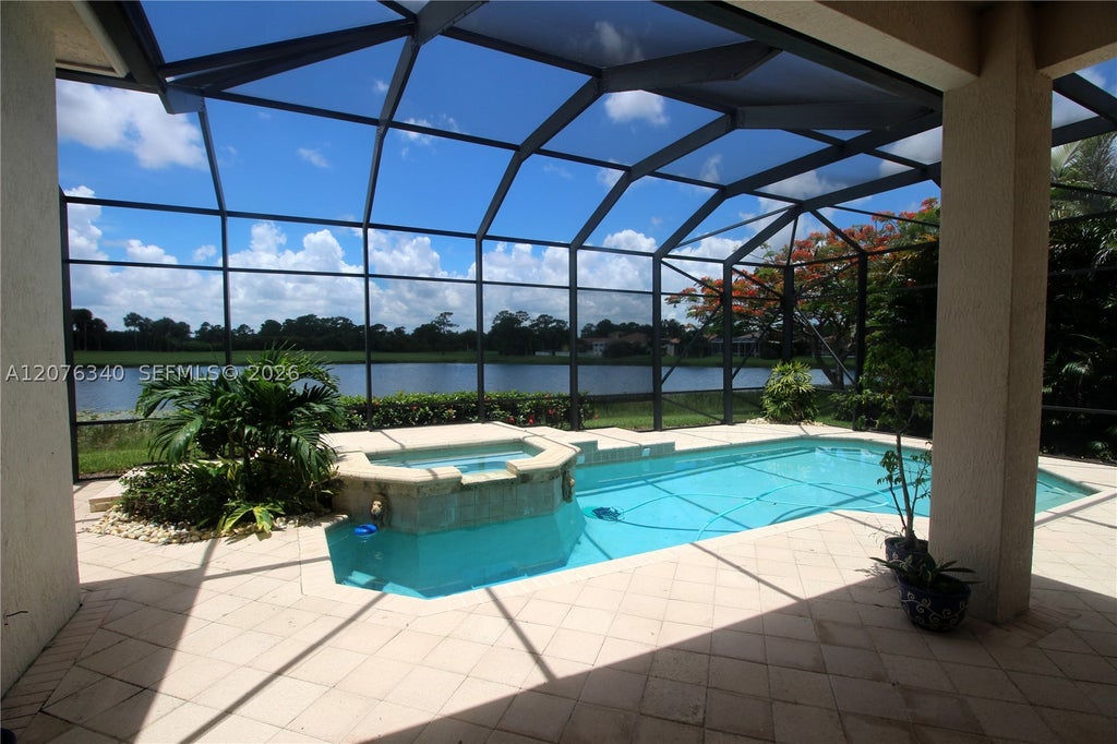Photo of 7635 Ironhorse Blvd, West Palm Beach, FL 33412 (MLS # A12076340)
