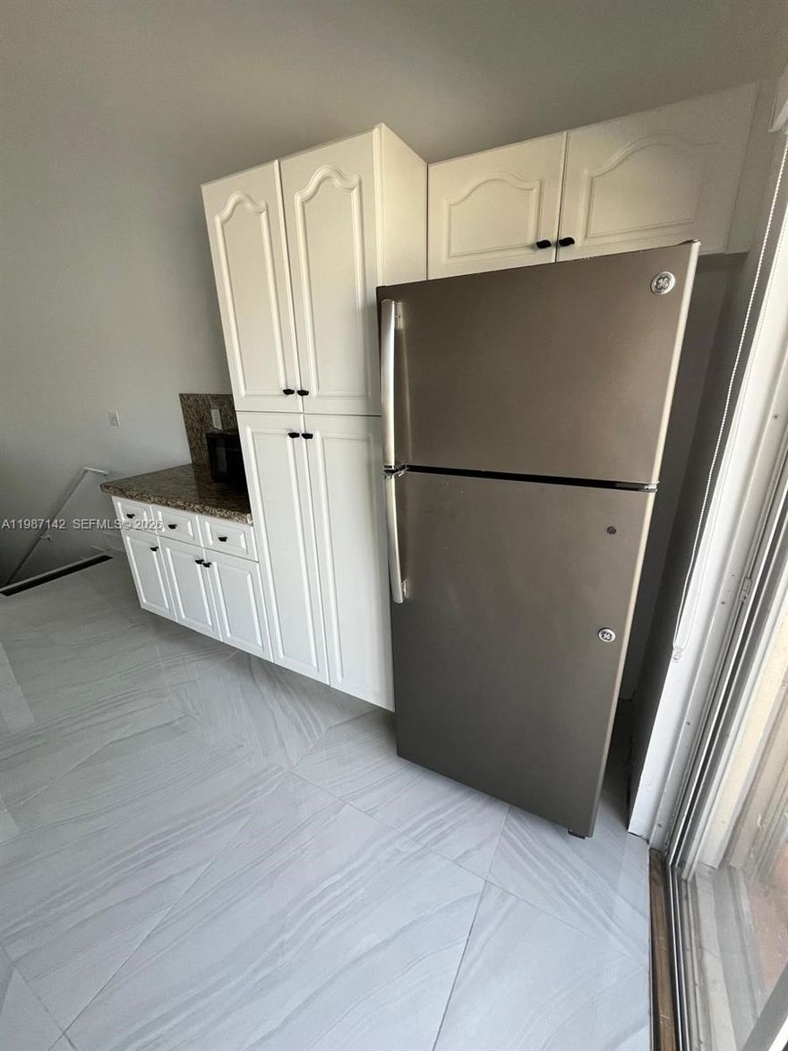 Beautifully remodeled property, move-in ready. This unit features two assigned parking spaces and plenty of guest parking available, offering convenience for both residents and visitors. Located in the desirable Poinciana Royale Villas Condo II, this home combines comfort, style, and convenience in a great setting. Perfect for those seeking a peaceful and well-located community.