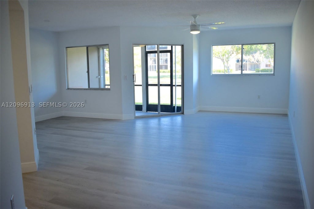 Photo of 12550 SW 15th St #111E, Pembroke Pines, FL 33027 (MLS # A12096913)