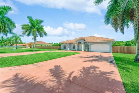 Single Family Residence in Miami FL 16963 215th Ter Ter.jpg