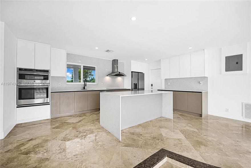 GREAT LOCATION!! 3-bed, 3 full baths, close to the ocean. Flexible 3rd bedroom with private bath, perfect as a guest suite or potential rental setup for extra income. Near shops, dining, and everyday conveniences in a highly strategic area. Oversized lot with room for a pool and possible additional units/expansion.