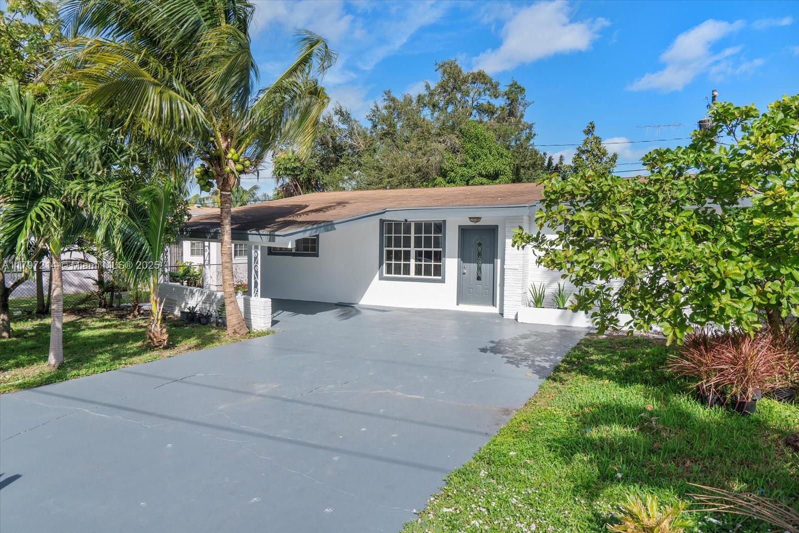 261 NE 172nd St .