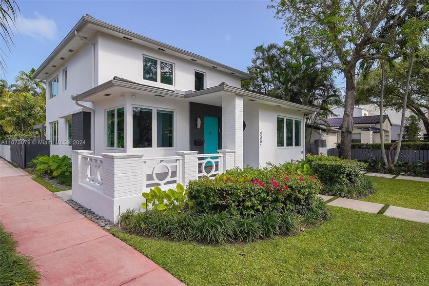 Introducing 4361 Royal Palm Ave, a fully renovated single-family home on a corner lot with a spacious backyard and swimming pool, perfect for the South Florida lifestyle. This two-story residence, redesigned by Ramin Design in 2016, features an open floor plan with an inviting kitchen, large dining area, and family room. Upstairs, you'll find the primary bedroom, two additional bedrooms, and a laundry closet. Downstairs offers one bedroom and an exterior guest suite with a mini kitchen. Enjoy a stunning Boffi kitchen with Sub-Zero and Wolf appliances, custom doors, and oak wood flooring throughout. The pool area is ideal for entertaining, with a spacious deck and outdoor TV. Conveniently located near 41st Street and the beach!