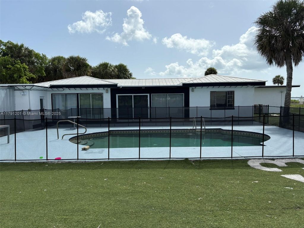 Photo of 6003 S Indian River Dr, Fort Pierce, FL 34982 (MLS # A11791201)