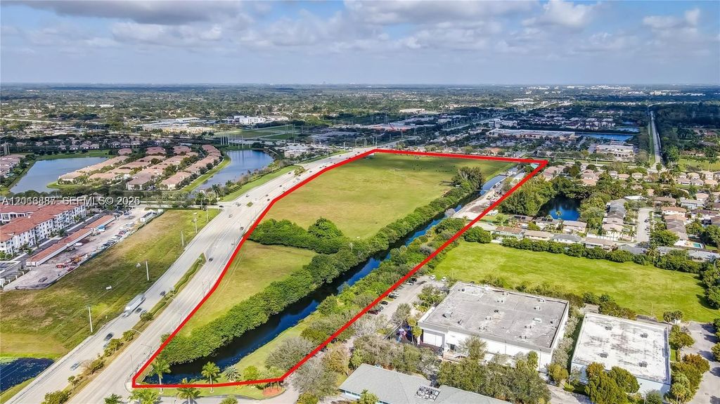 Photo of 8020 Stirling Rd, Davie, FL 33024 (MLS # A12016887)