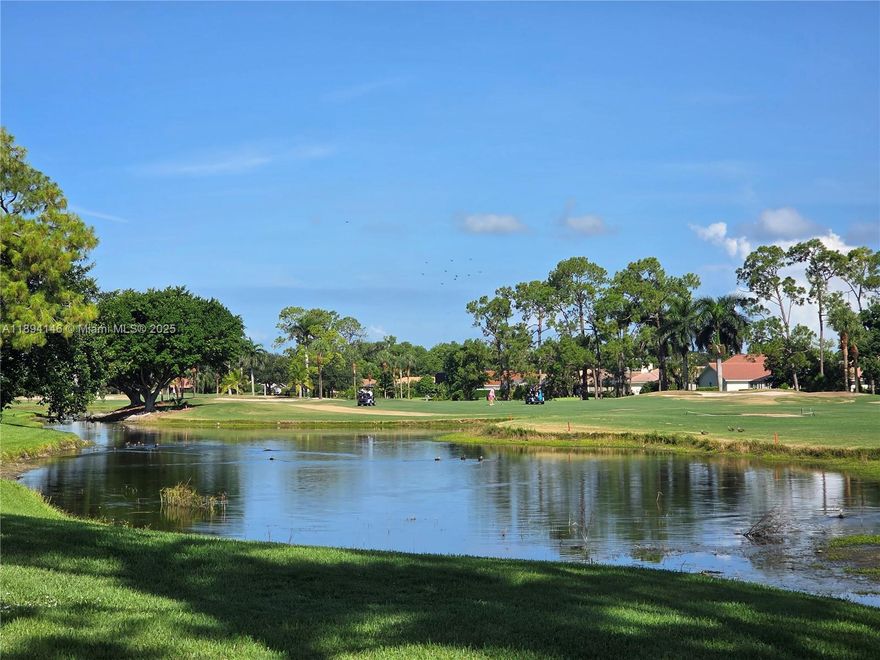 This bright light corner unit offers peaceful views of the water and golf course in a well-kept, garden-style condo. Short drive to the National Pickleball Center, local parks, and plenty of entertainment options, quick drive to schools and shopping. A great spot for anyone looking for convenience, and a calm place to call home.