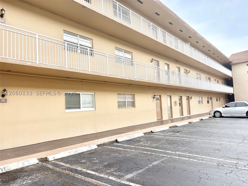 Photo of 5011 W Oakland Park Blvd #310, Lauderdale Lakes, FL 33313 (MLS # A12060133)