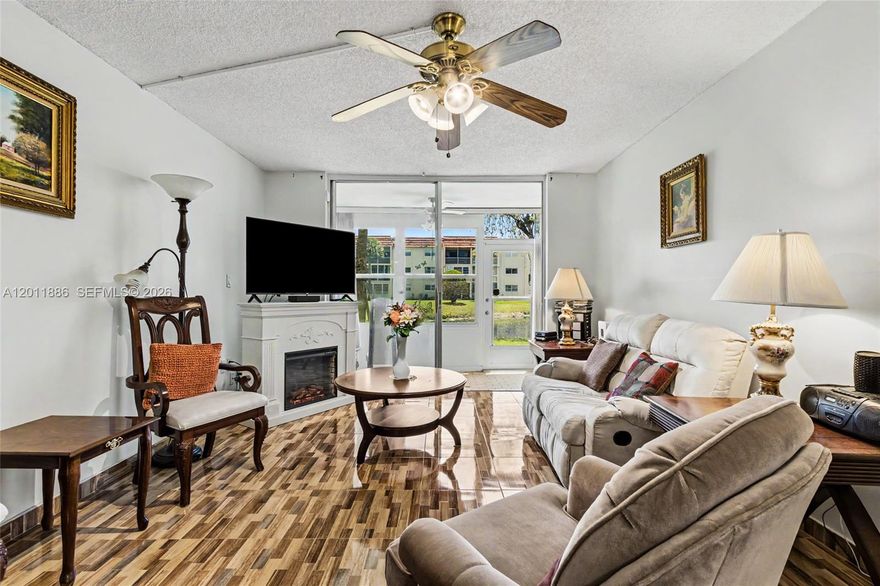 Truly stunning waterfront views from this first floor 1/1 in building 12 of Sunrise Lakes Phase I. Gorgeous lake views from the living room and the bedroom - even from the kitchen. Enclosed 
porch with exit door allows you to be lakeside in about 30 steps. Beautiful tile floors and no mirrored walls in the living and dining rooms. Accordion shutters protect the patio. Surprisingly large walk-in closet. Unit is conveniently located across from the laundry room, and your parking space right out front. Unit also comes with extra storage. You really have to see it in person to appreciate these views - it will not disappoint. Seller financing available. Community amenities include pool, fitness center, clubhouse, theater, transportation, cable. COA says 55+, no leasing and no pets. 50 year re-certifications have been completed. Some trucks are OK, contact agent to confirm.