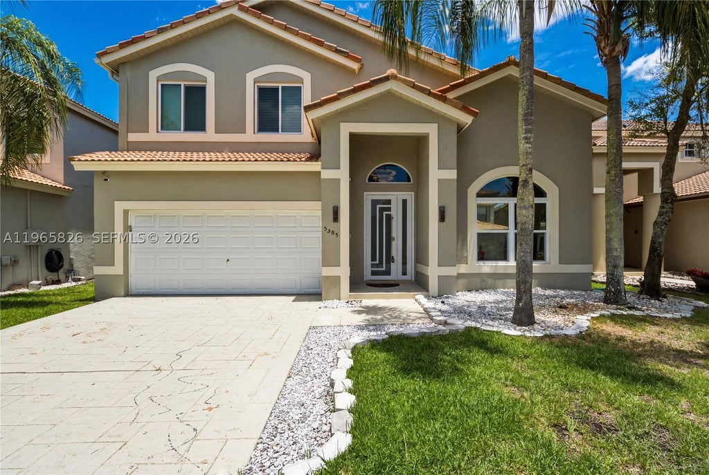 Photo of 5285 NW 112th Ter, Coral Springs, FL 33076 (MLS # A11965826)