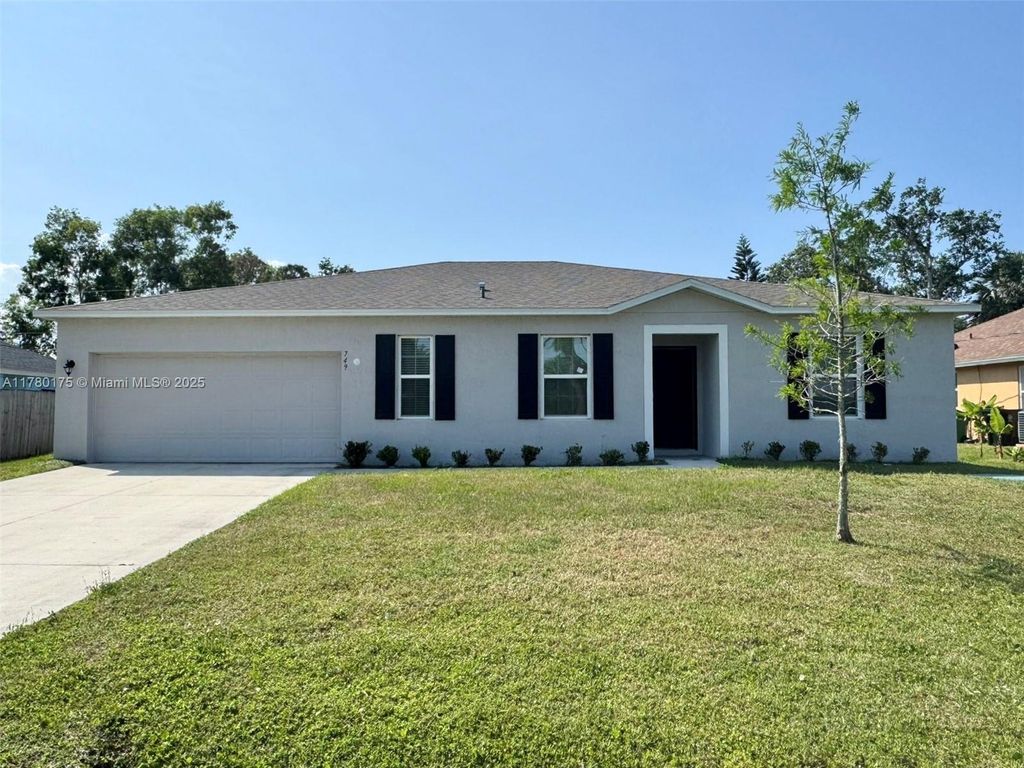 Photo of 749 SE Karrigan Ter, Port St Lucie, FL 34983 (MLS # A11780175)