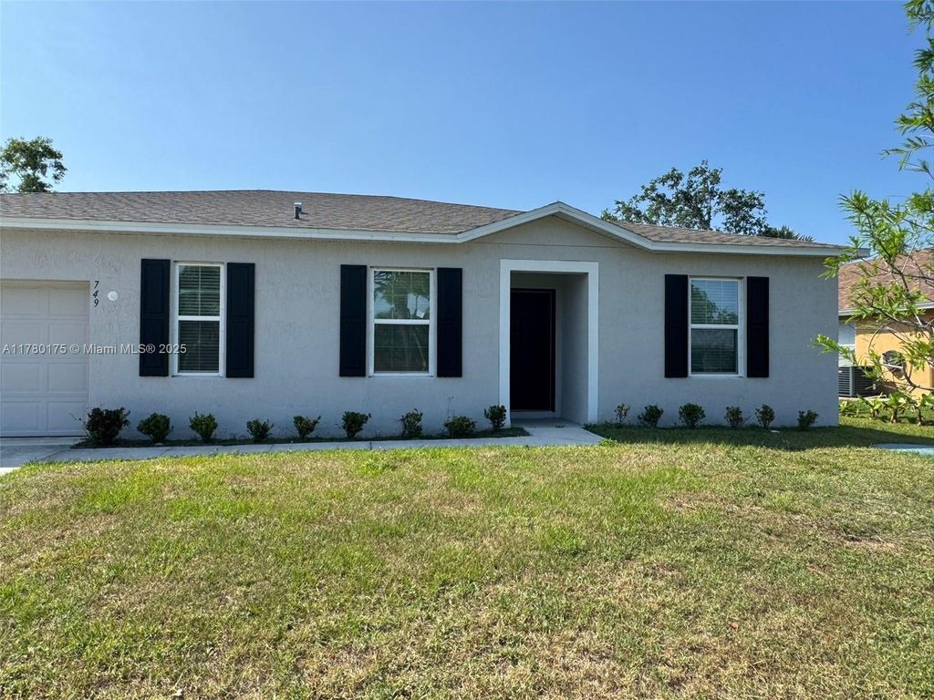 Photo of 749 SE Karrigan Ter, Port St Lucie, FL 34983 (MLS # A11780175)