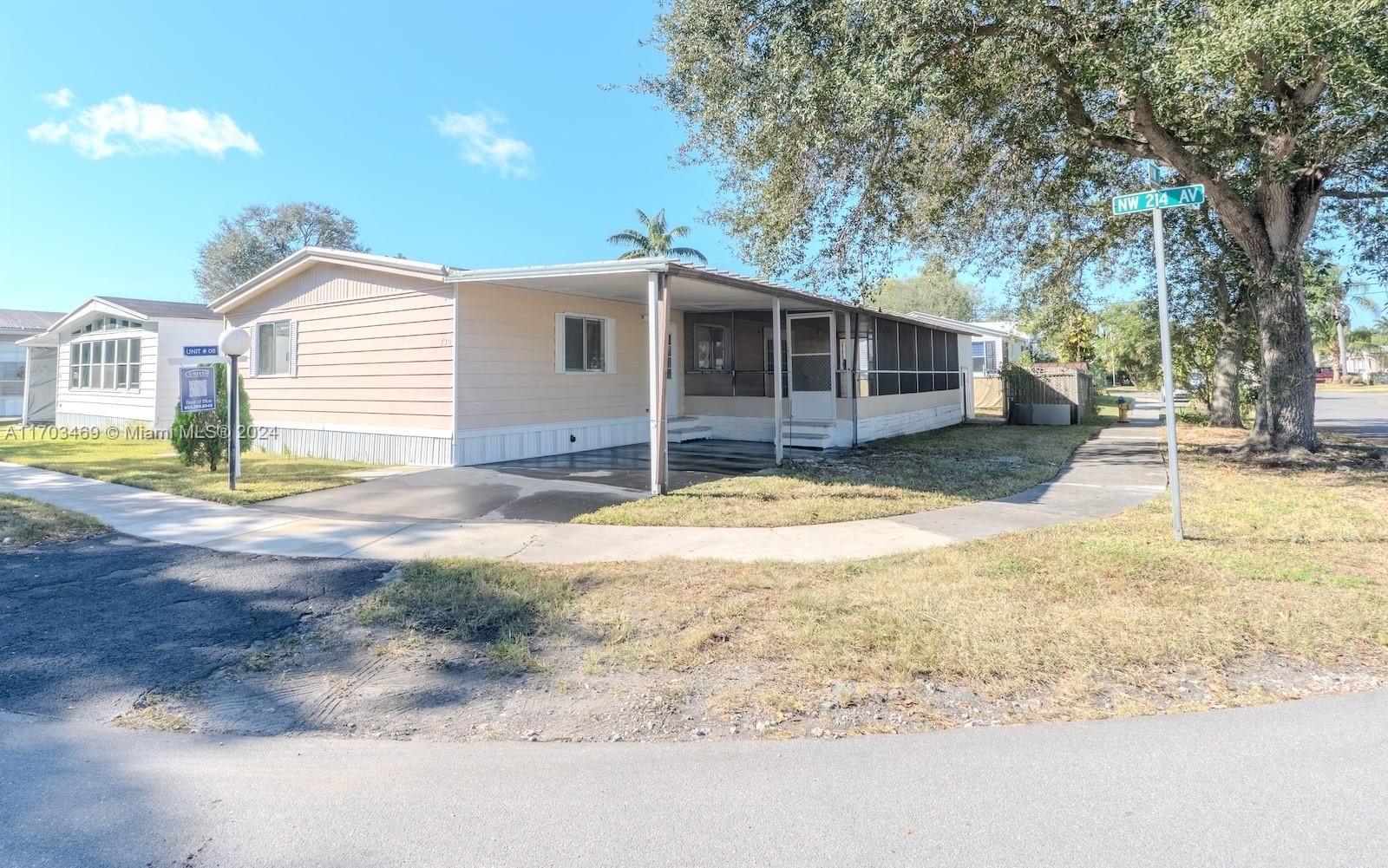 Price reduced where YOU OWN THE LAND! Recently remodeled 3-Bed, 2-Bath Mobile Home in West Pembroke Pines. Step into this beautifully mobile home nestled in the sought-after community of Holly Lake Park. In a corner lot this home boasts modern upgrades throughout, including a bright and open floor plan with fresh paint, and stylish flooring. Both bathrooms have been tastefully renovated with modern finishes. Enjoy serene outdoor living with a spacious lot, private patio, and lush landscaping. Holly Lake offers a low HOA, A+ schools, and a safe family, pet-friendly atmosphere with amenities such as a community pool, clubhouse, playground, and more for ALL AGES. Move-in ready and waiting for you!