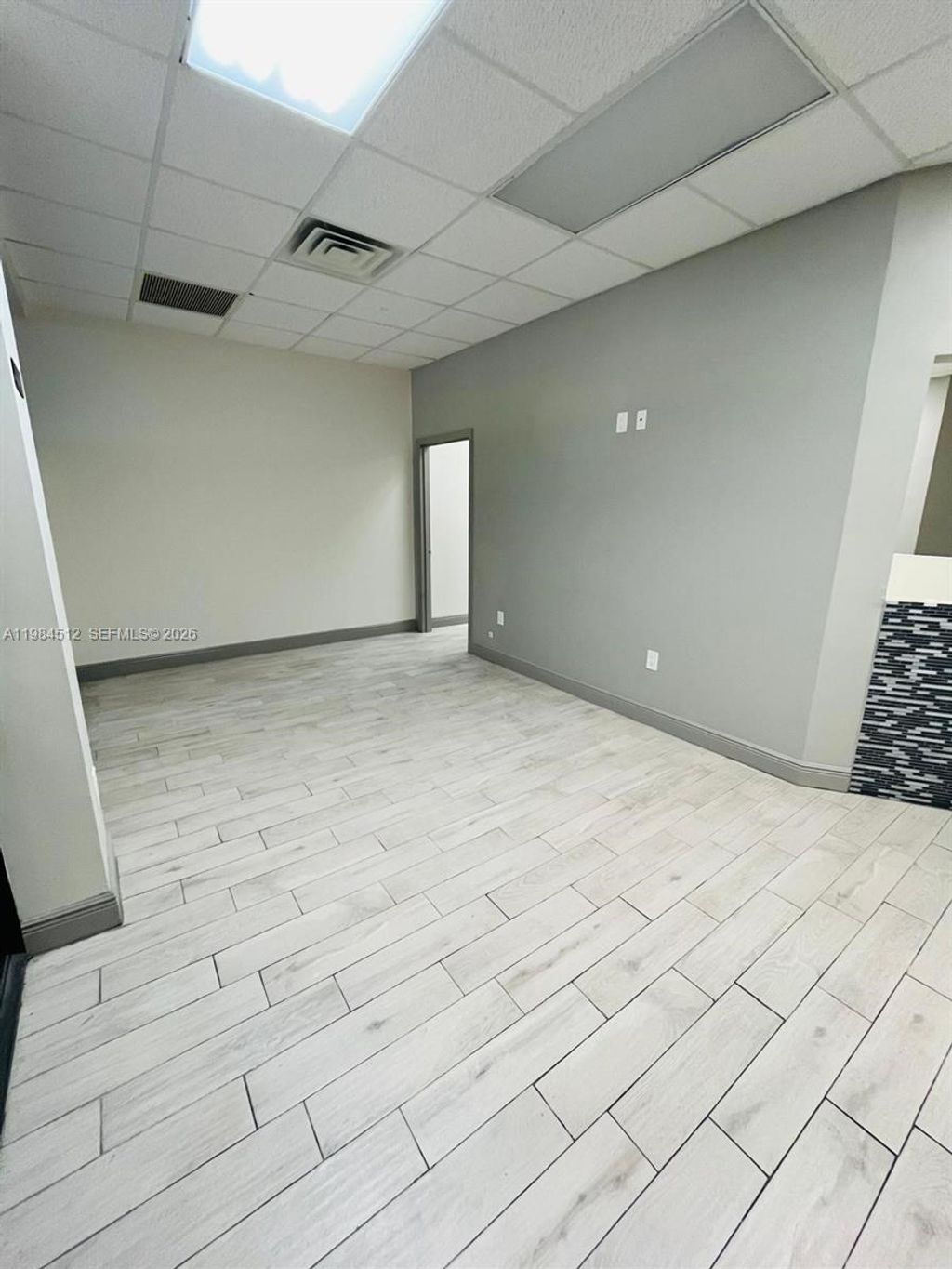 Photo of 6101 W Atlantic Blvd #102, Margate, FL 33063 (MLS # A11984512)