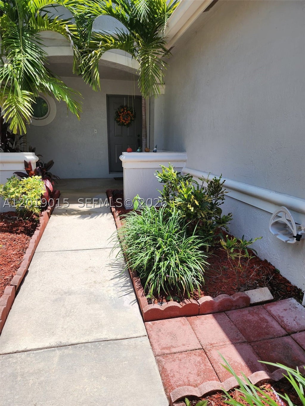 Photo of 8014 Big Pine Way, Riviera Beach, FL 33407 (MLS # A12019015)