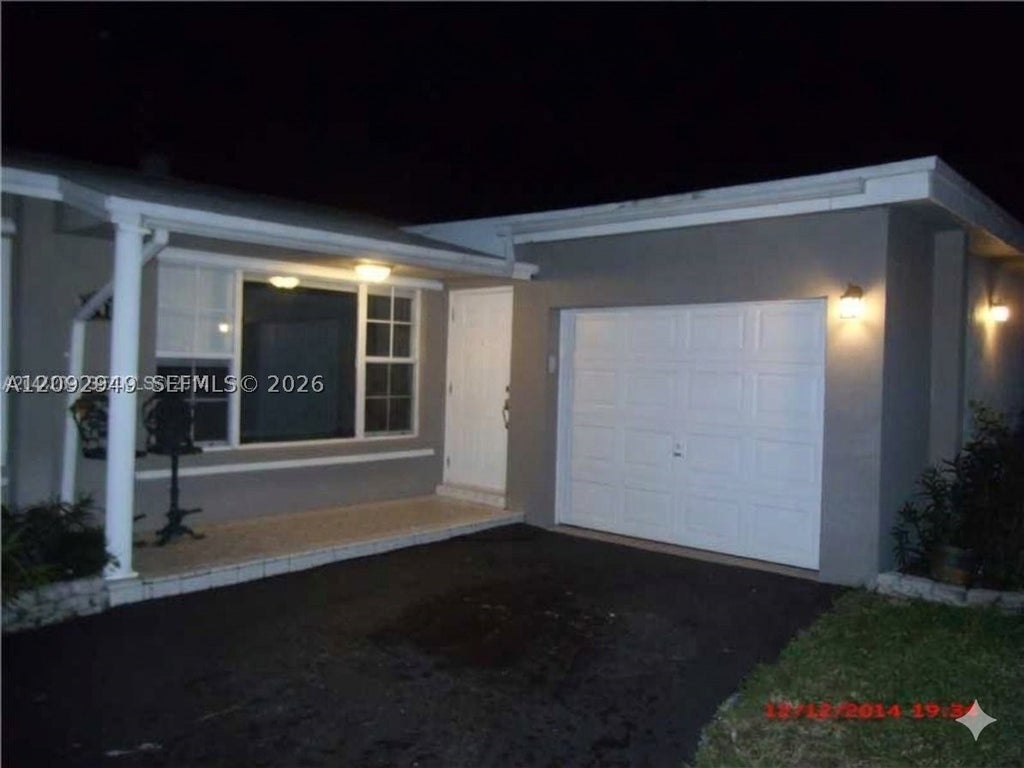 Photo of 9470 NW 24th St, Sunrise, FL 33322 (MLS # A12092949)