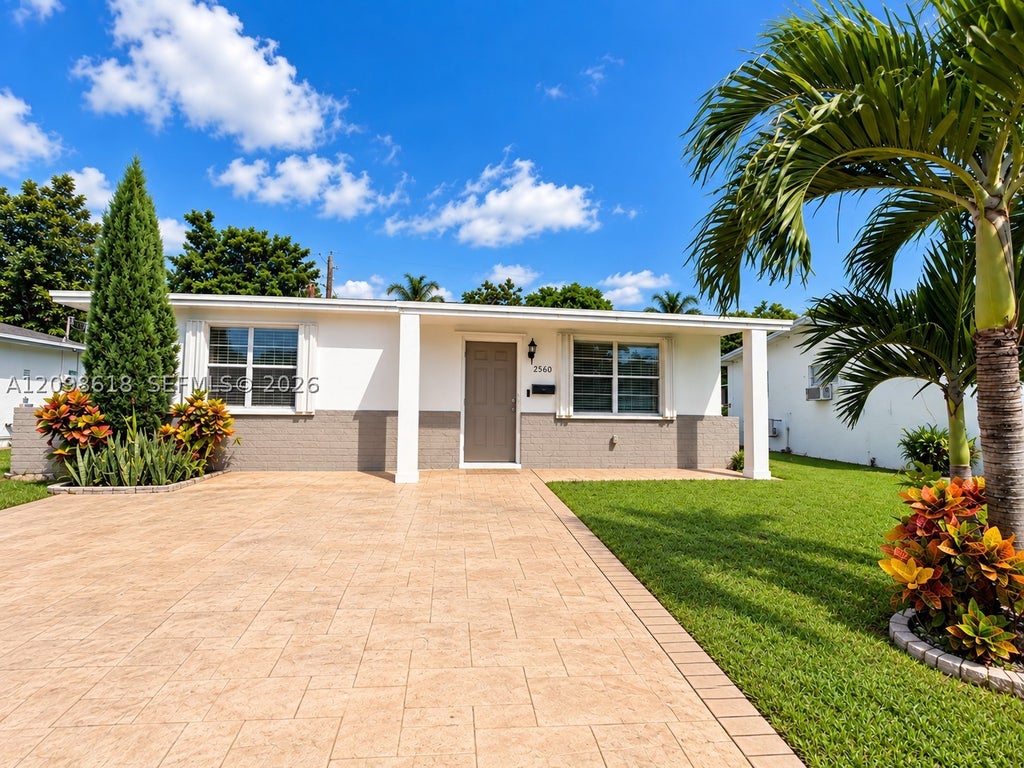 Photo of 2560 NW 81st Ter, Sunrise, FL 33322 (MLS # A12098618)