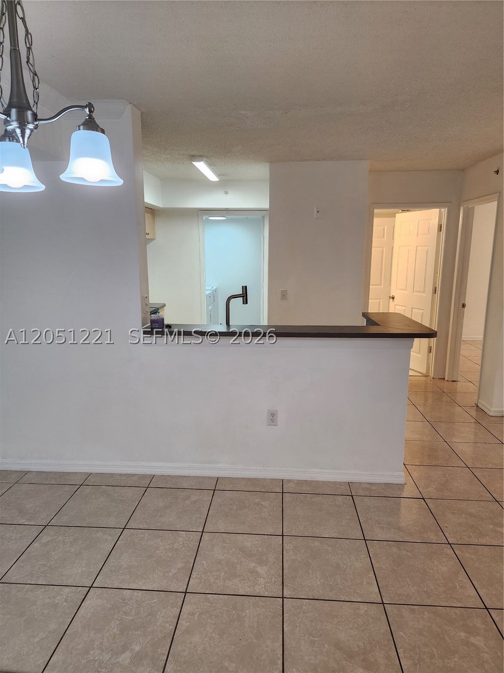 Photo of 2433 Centergate Dr #203, Miramar, FL 33025 (MLS # A12051221)