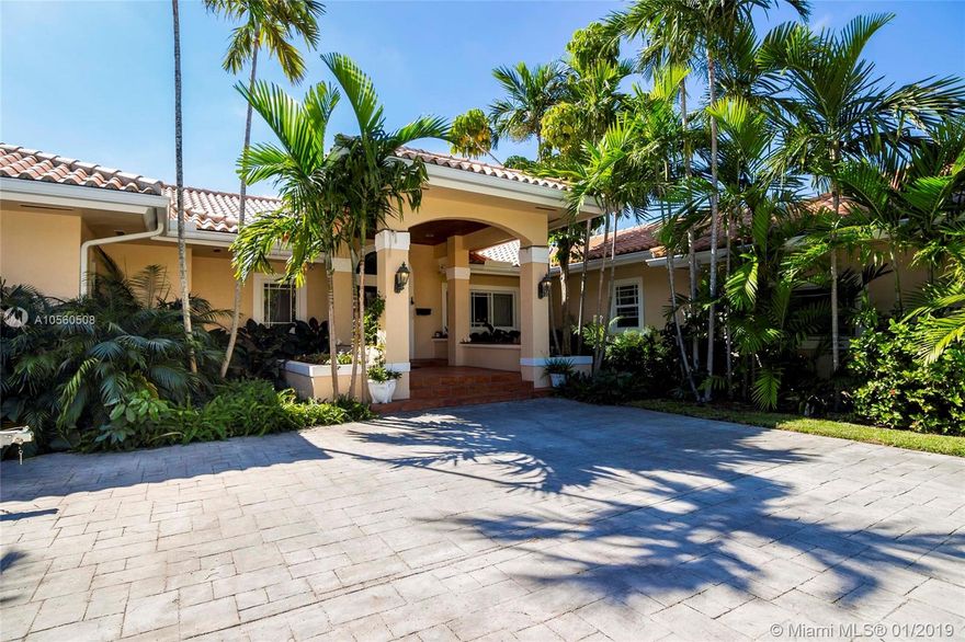 An Island like oasis in prestigious Surfside. A boaters dream with direct ocean access and fabulous views on 100 feet of waterfrontage.
This 7BR/5BA 4,761 square foot home is situated on a 20,100 square foot corner double lot. Can move right in or has the potential to be subdivided for redevelopment. New seawall and impact resistant windows. Steps from the beach and minutes to A+ schools, Bal Harbour Shops and the New super lux Four Seasons. Enjoy stunning sunsets amongst a variety of tropical fruit trees and palms.