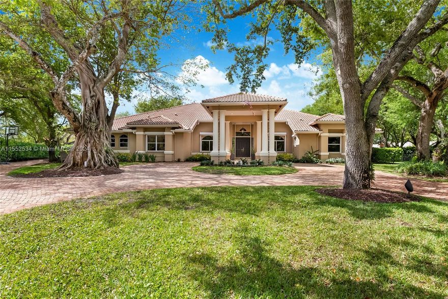 Enchanting canal front estate in the gated community “Ambience” with only 7 homes in Baptist/Galloway Glen area. Largest property in community w/ imposing exterior & enormous brick driveway. Light & bright inside w/ 16ft ceilings, fireplace & marble floors. The living, dining, family rm, & bedrooms are oversized w/ abundance of closet & storage. Den can be 6th bedroom. Fully equipped kitchen w/ wine cooler. Adjacent family room offers open concept ideal for entertaining w/ views to expansive heated pool, backyard w/ playground & landscape lighting. Inside/outside sound & camera systems. Pool & deck rebuilt in 2016. Large retractable awning extends beyond covered patio. Usable canal has easy access for canoes, kayaks, & paddle boards. Whole house generator & EV charging port are a bonus!!