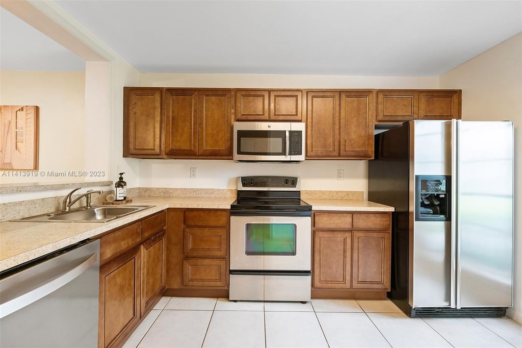 Photo of 5048 Heatherhill Ln #1106, Boca Raton, FL 33486 (MLS # A11413919)