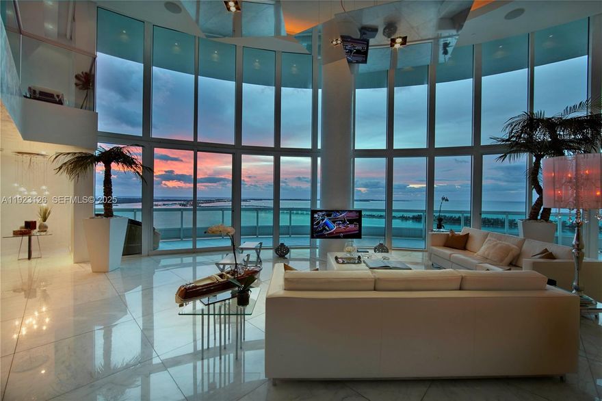 Modern and elegant 2 story unit with double height ceiling at Santa Maria in Brickell. 4BR/4.5BA totaling 5,730 Sqft (532m2) of interior plus a wraparound Balcony. Unobstructed views overlooking direct Ocean, Downtown Skyline & Key Biscayne. Custom design detail includes a spacious living and dining area, entertaining space, lots of walking closets, marble interior finishes and floor to celling windows. Option to buy a private dock is available with this unit up to 90 ft yacht (a few options avail). 3 parking spaces. Amenities include a new bay front pool, marina, new fitness center in the sky, billiards, business center and a 6,000 Sqft clubhouse, Pilates studio, outdoor kids playground in the garden.