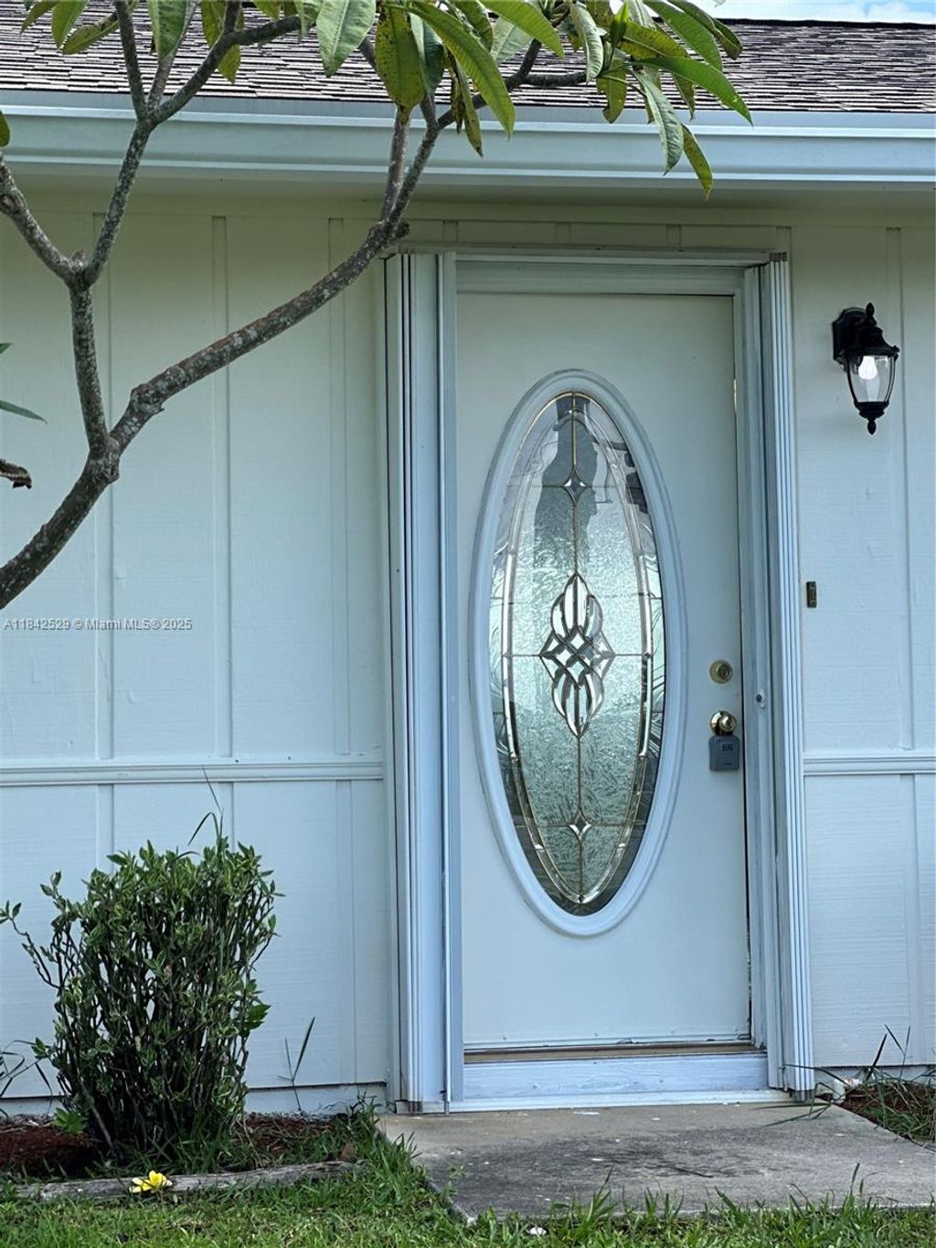 Photo of 885 SW California Blvd, Port St Lucie, FL 34953 (MLS # A11842529)