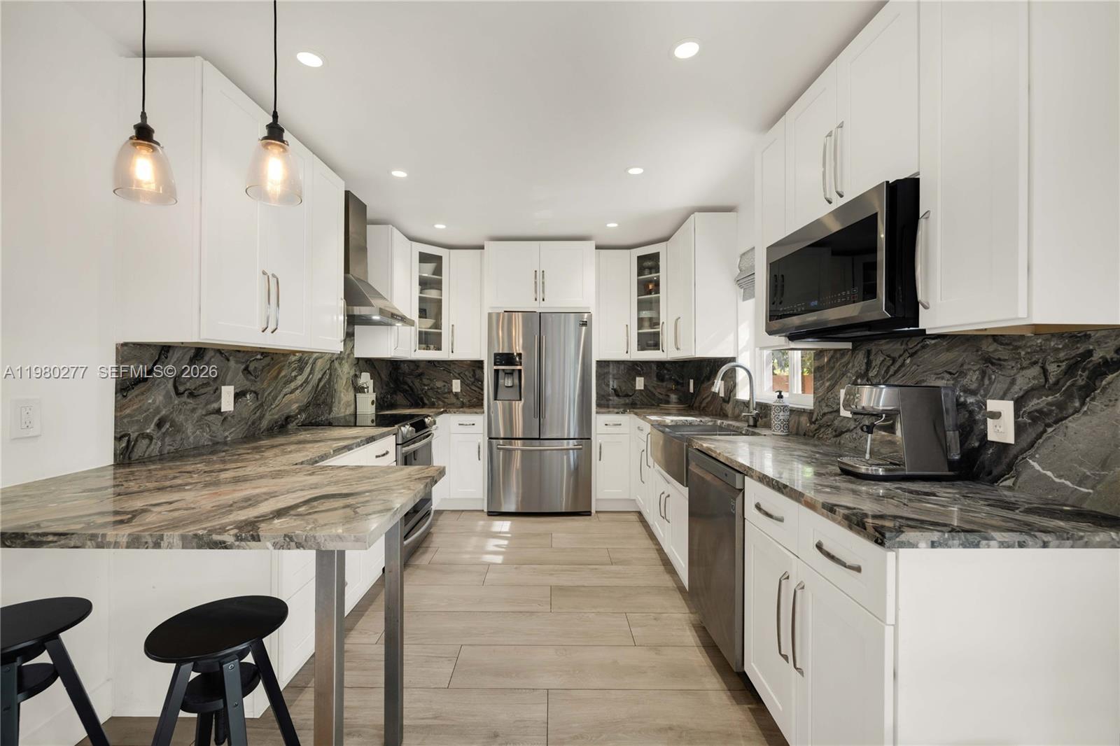 View photos, virtual tours, details... 10533 NE 3rd Ct