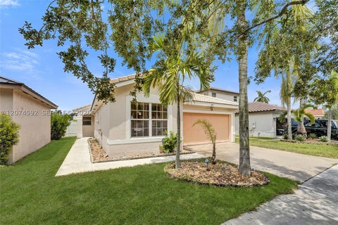 Photo of 1822 SW 176th Ave, Miramar, FL 33029 (MLS # A12074592)