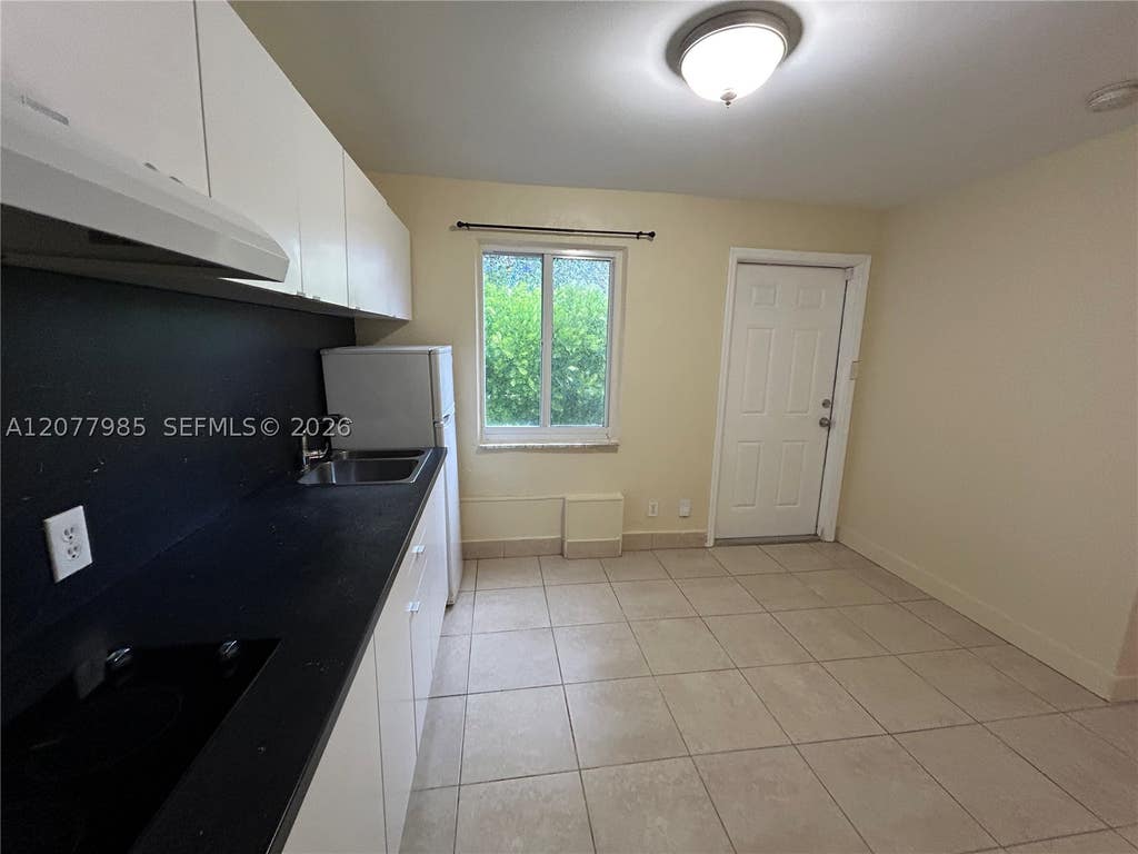 Photo of 1642 Polk St #C, Hollywood, FL 33020 (MLS # A12077985)