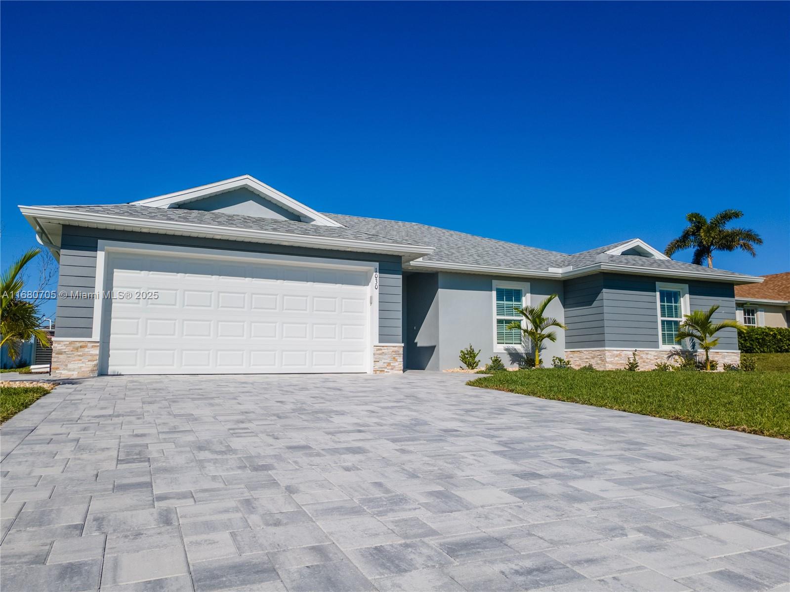 5.99% 30 year fixed - FHA , 3.5% down and 15k towards closing costs with a full price offer available when using the builders preferred lender! Discover your future dream home with this exceptional New Construction property. This unique floor plan stands out from other spec homes in the area, offering a blend of style, functionality, and comfort that is hard to find.
Located in the vibrant NW Cape Coral area, this home is perfectly situated where the community is rapidly growing. The property is already connected to city water and sewer services, ensuring convenience and reliability. Plus, it's located in an X Flood zone, so there’s no mandatory flood insurance for buyers using a mortgage.
***Rooms virtually staged ***